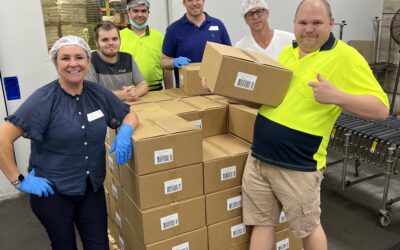 PAG staff volunteering to work alongside production line workers at Mt Druitt